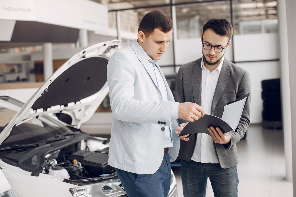 Professional towing team showing how to scrap a car for cash legally