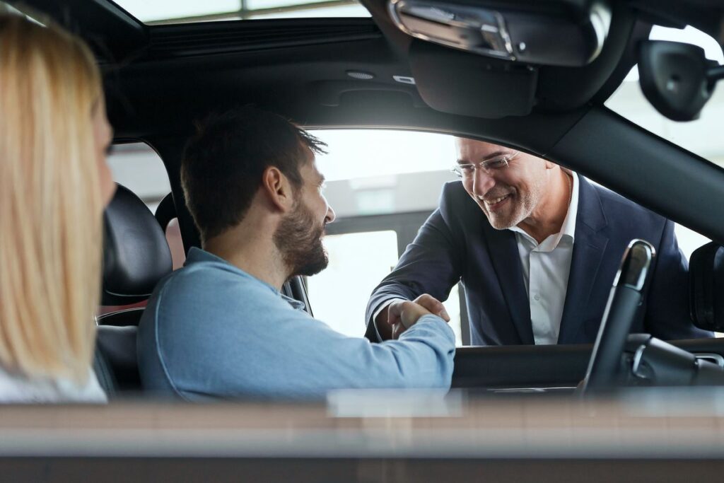 Professional buyer evaluating good condition used cars safely
