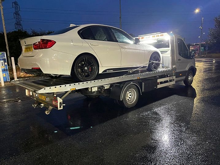 Professional tow truck showing the best way to sell non running car safely