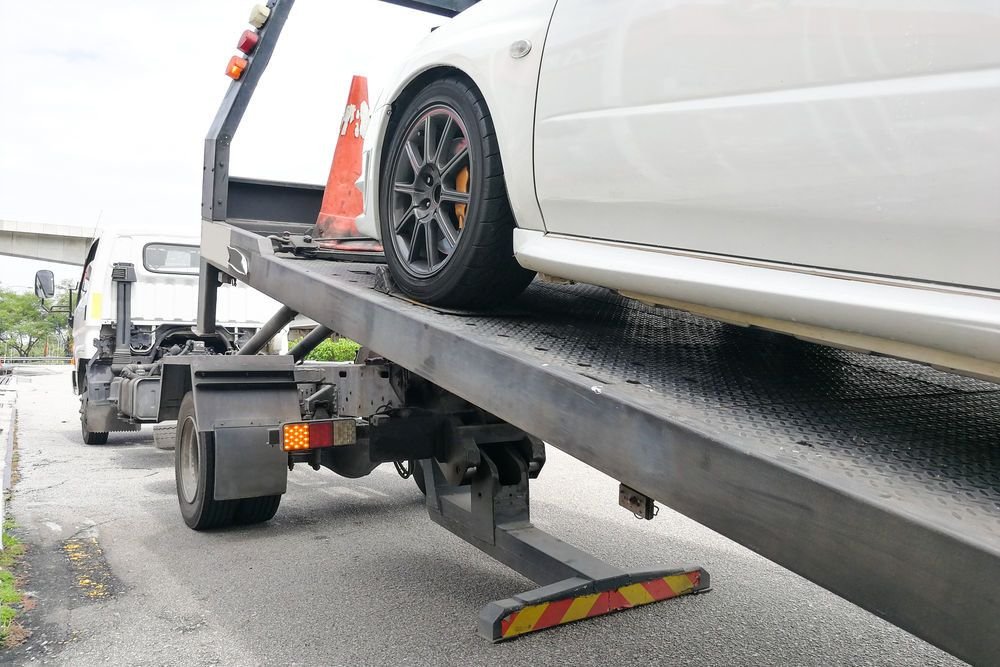 Professional towing truck loading a car in Tarneit