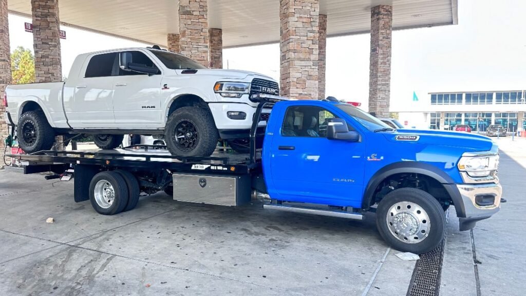 Tow truck loading a wrecked vehicle for our cash for damaged cars melbourne service