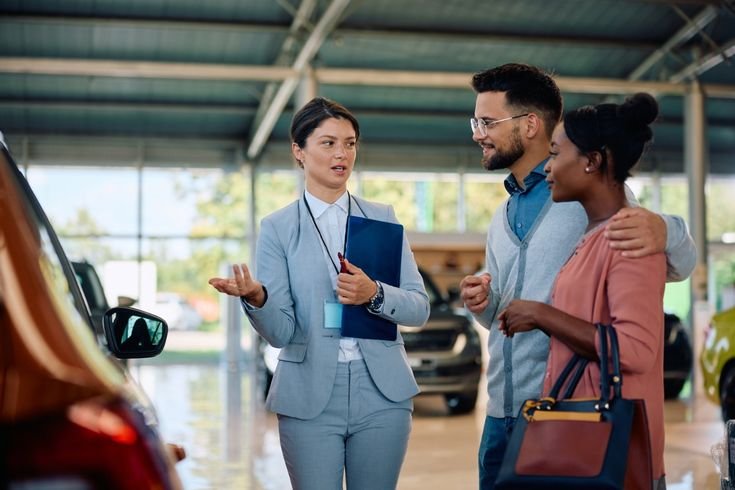 Professional auto buyer explaining trade in vs selling privately options safely